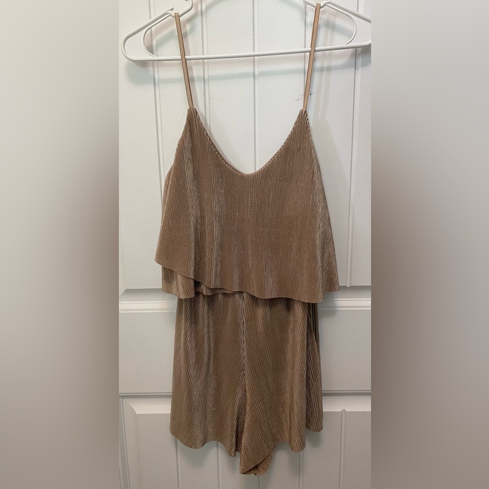 Rolla Coster simmering brown romper. Size Medium. Adjustable straps. 100% poly.
